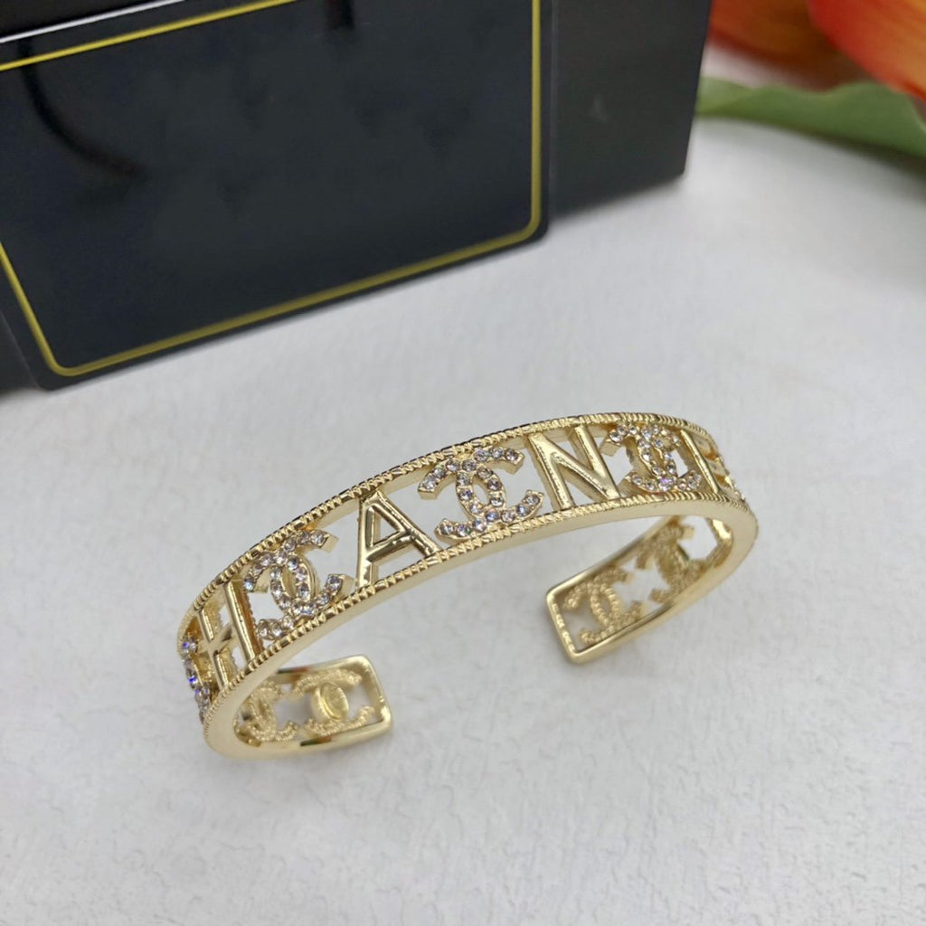 Chanel Logo Cuff Gold Bracelet